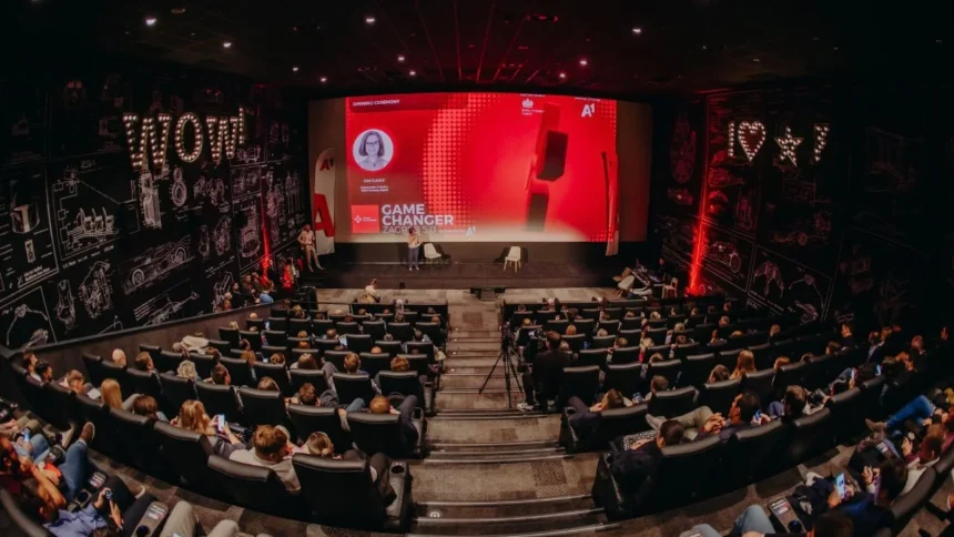 Opening ceremony of Game Changer Zagreb 5.0 at CineStar cinemas in Z Centar with a packed audience facing a red stage screen
